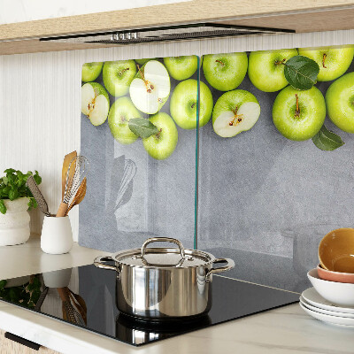 Planche à découper verre Pommes vertes sur une surface grise