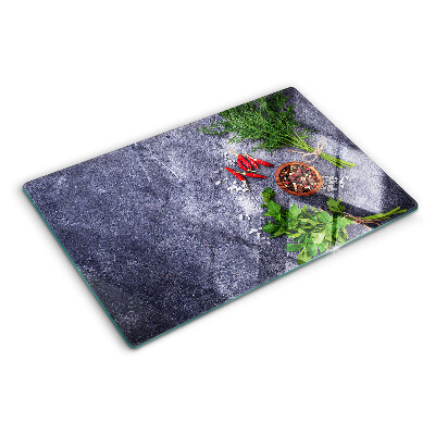 Planche à découper en verre Herbes et épices sur fond de pierre