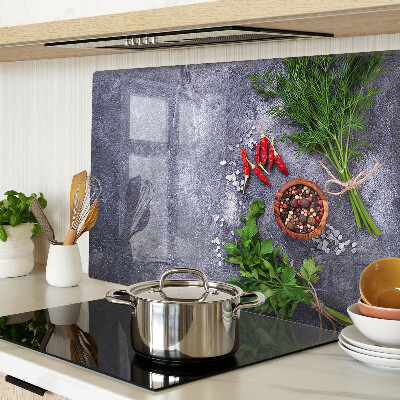 Planche à découper en verre Herbes et épices sur fond de pierre