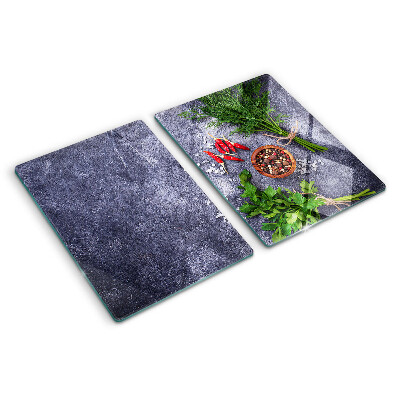 Planche à découper en verre Herbes et épices sur fond de pierre
