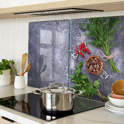 Planche à découper en verre Herbes et épices sur fond de pierre