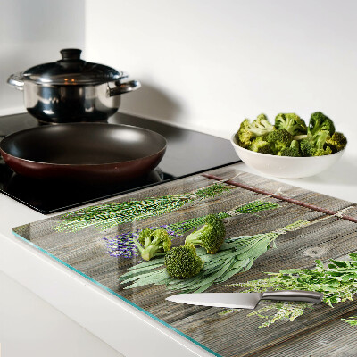 Planche à découper verre Herbes sur fond de bois