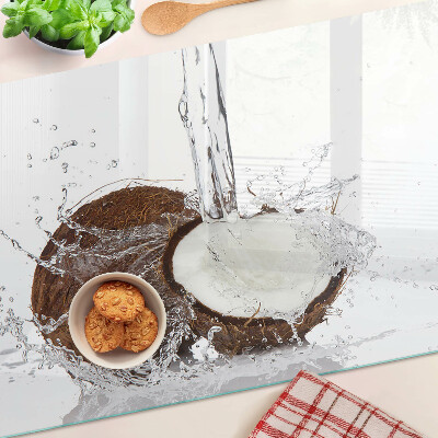 Planche à découper en verre Noix de coco avec de l'eau et des éclaboussures
