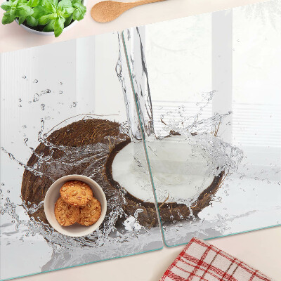 Planche à découper en verre Noix de coco avec de l'eau et des éclaboussures