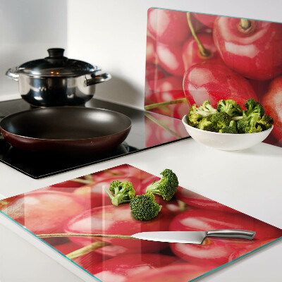 Planche à découper en verre Cerises sur fond rouge