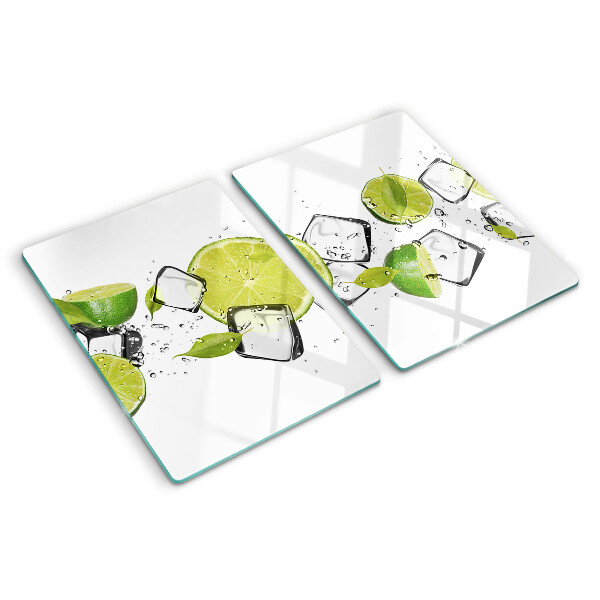 Planche à découper en verre Citrons avec de la glace dans l'eau