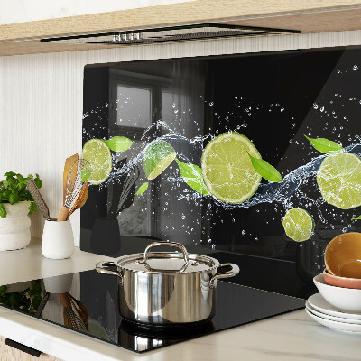 Planche à découper en verre Citrons dans l'eau avec des feuilles de menthe