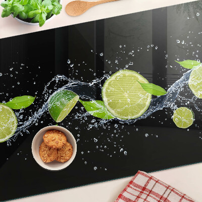 Planche à découper en verre Citrons dans l'eau avec des feuilles de menthe