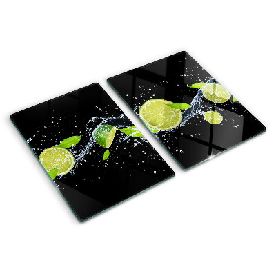 Planche à découper en verre Citrons dans l'eau avec des feuilles de menthe