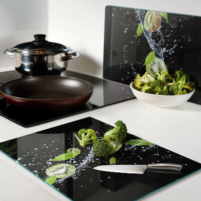 Planche à découper verre Kiwi dans l'eau avec des feuilles