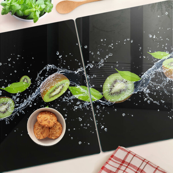 Planche à découper verre Kiwi dans l'eau avec des feuilles