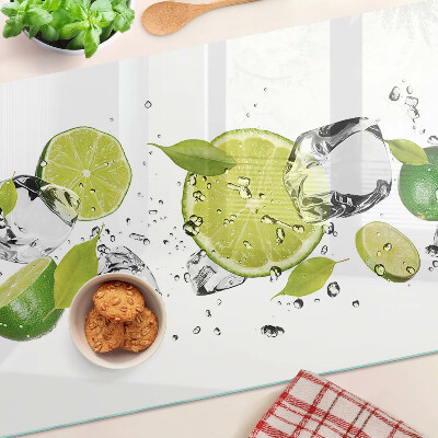 Planche à découper en verre Citrons et glace dans l'eau