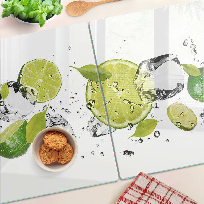 Planche à découper en verre Citrons et glace dans l'eau