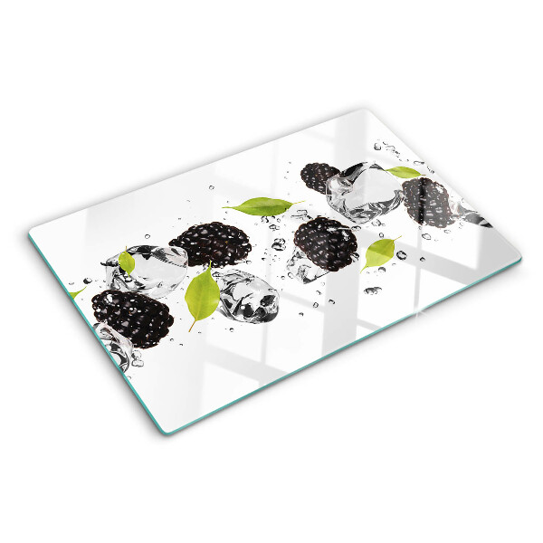 Planche à découper verre Framboises avec des feuilles et des gouttes d'eau
