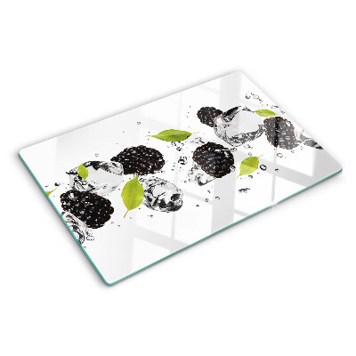 Planche à découper verre Framboises avec des feuilles et des gouttes d'eau