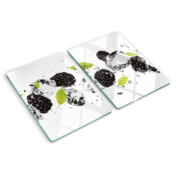 Planche à découper verre Framboises avec des feuilles et des gouttes d'eau