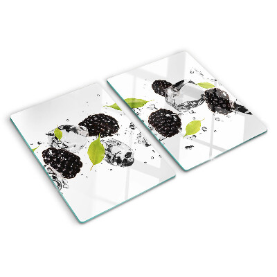 Planche à découper verre Framboises avec des feuilles et des gouttes d'eau