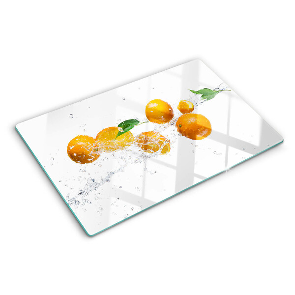 Planche à découper en verre Agrumes avec de l'eau