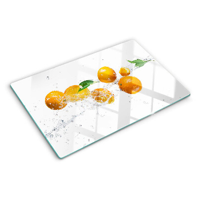 Planche à découper en verre Agrumes avec de l'eau