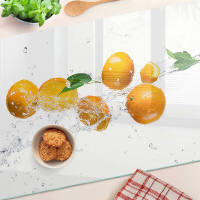 Planche à découper en verre Agrumes avec de l'eau