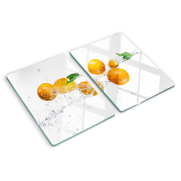 Planche à découper en verre Agrumes avec de l'eau