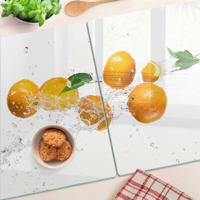 Planche à découper en verre Agrumes avec de l'eau