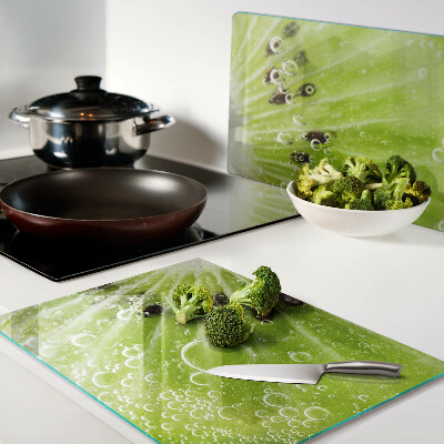 Planche à découper en verre Kiwi avec des gouttes d'eau