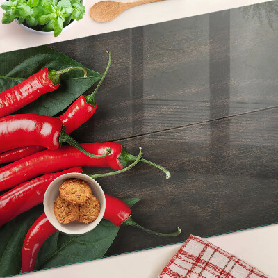 Planche à découper verre Piments sur fond de bois