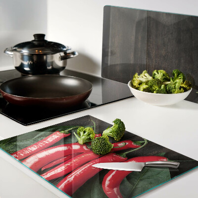 Planche à découper verre Piments sur fond de bois