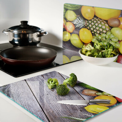 Planche à découper verre Fruits sur fond de bois
