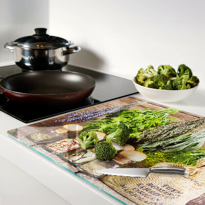 Planche à découper en verre Herbes et épices sur fond de bois