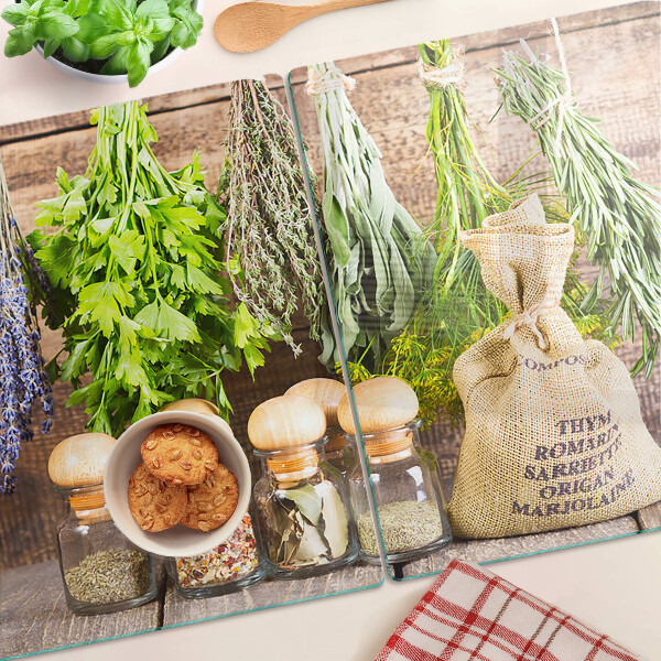 Planche à découper en verre Herbes et épices sur fond de bois