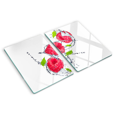 Planche à découper en verre Framboises dans l'eau avec des feuilles