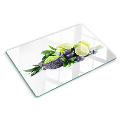 Planche à découper en verre Citrons et raisins sur fond vert