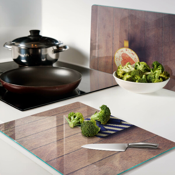 Planche à découper verre Un cadeau avec un cœur sur une tasse