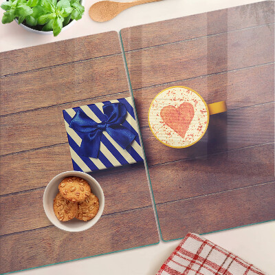 Planche à découper verre Un cadeau avec un cœur sur une tasse