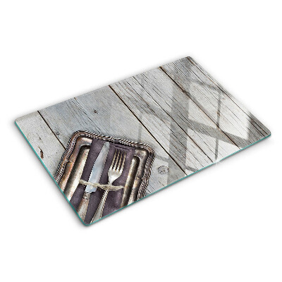 Planche à découper en verre Couverts rustiques sur fond de bois