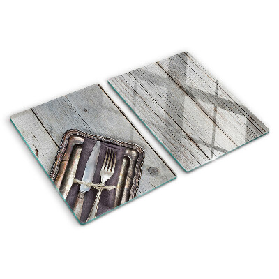 Planche à découper en verre Couverts rustiques sur fond de bois