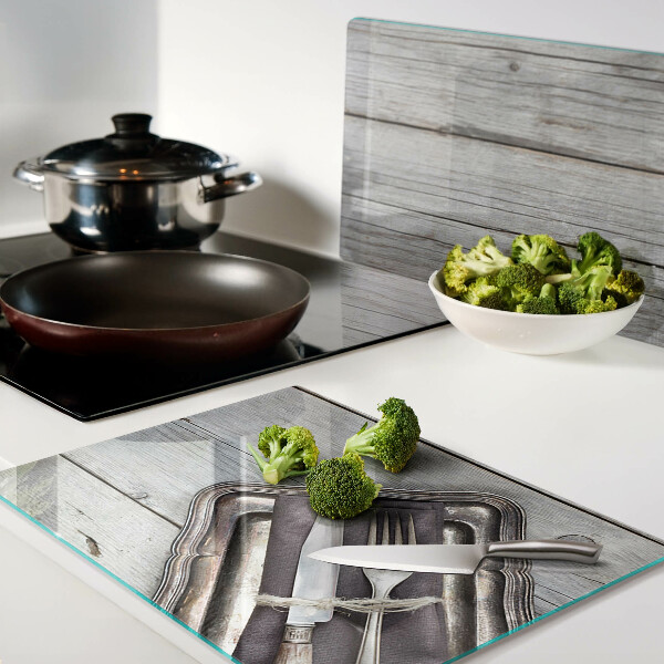 Planche à découper en verre Couverts rustiques sur fond de bois