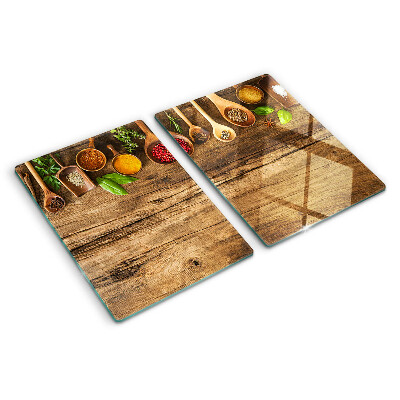 Planche à découper en verre Épices et herbes sur fond de bois
