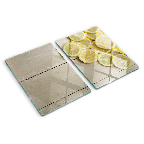 Planche à découper verre Tranches de citron sur fond de bois