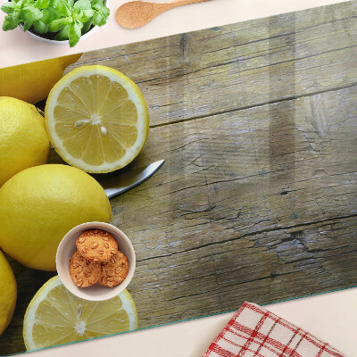 Planche à découper verre Citrons sur fond de bois