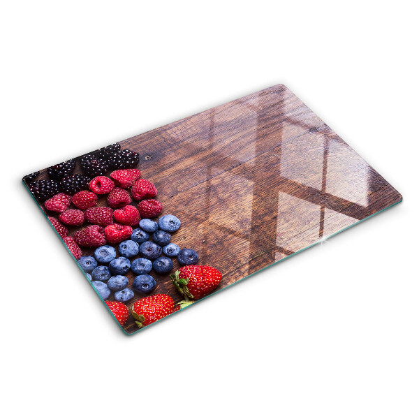 Planche à découper verre Fruits des bois sur fond de bois