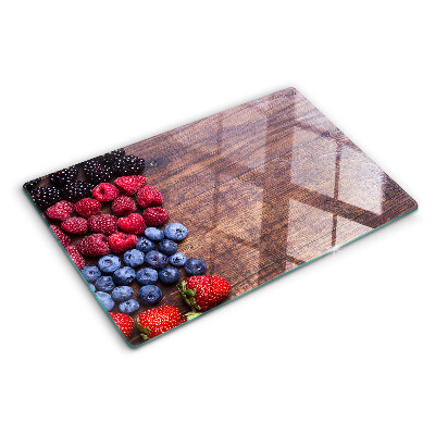 Planche à découper verre Fruits des bois sur fond de bois