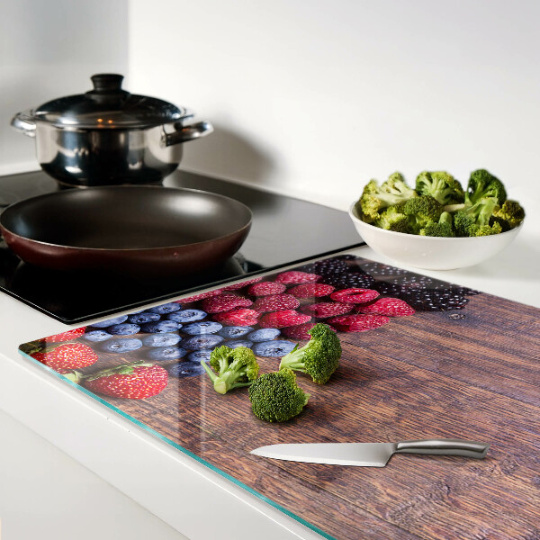 Planche à découper verre Fruits des bois sur fond de bois