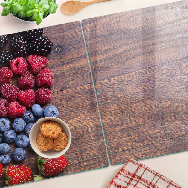 Planche à découper verre Fruits des bois sur fond de bois