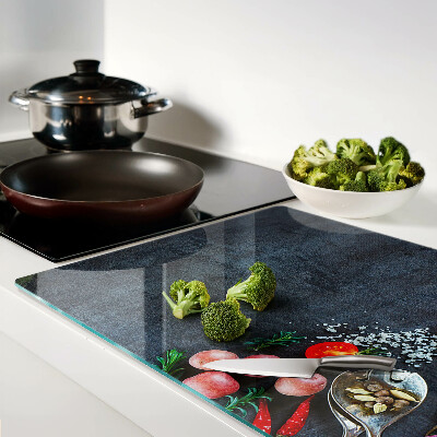 Planche à découper verre Légumes et épices sur fond sombre