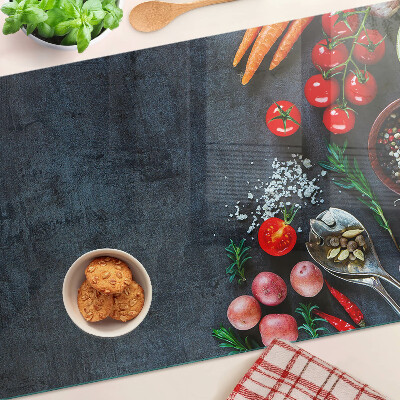 Planche à découper verre Légumes et épices sur fond sombre