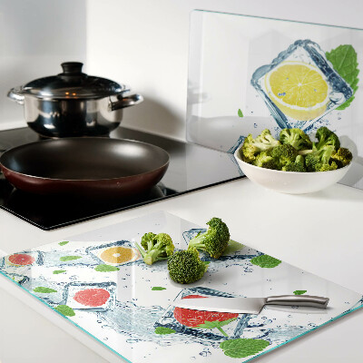 Planche à découper en verre Motif de fruits avec des tranches colorées