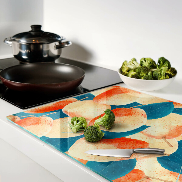 Planche à découper verre Pêches sur fond de feuilles
